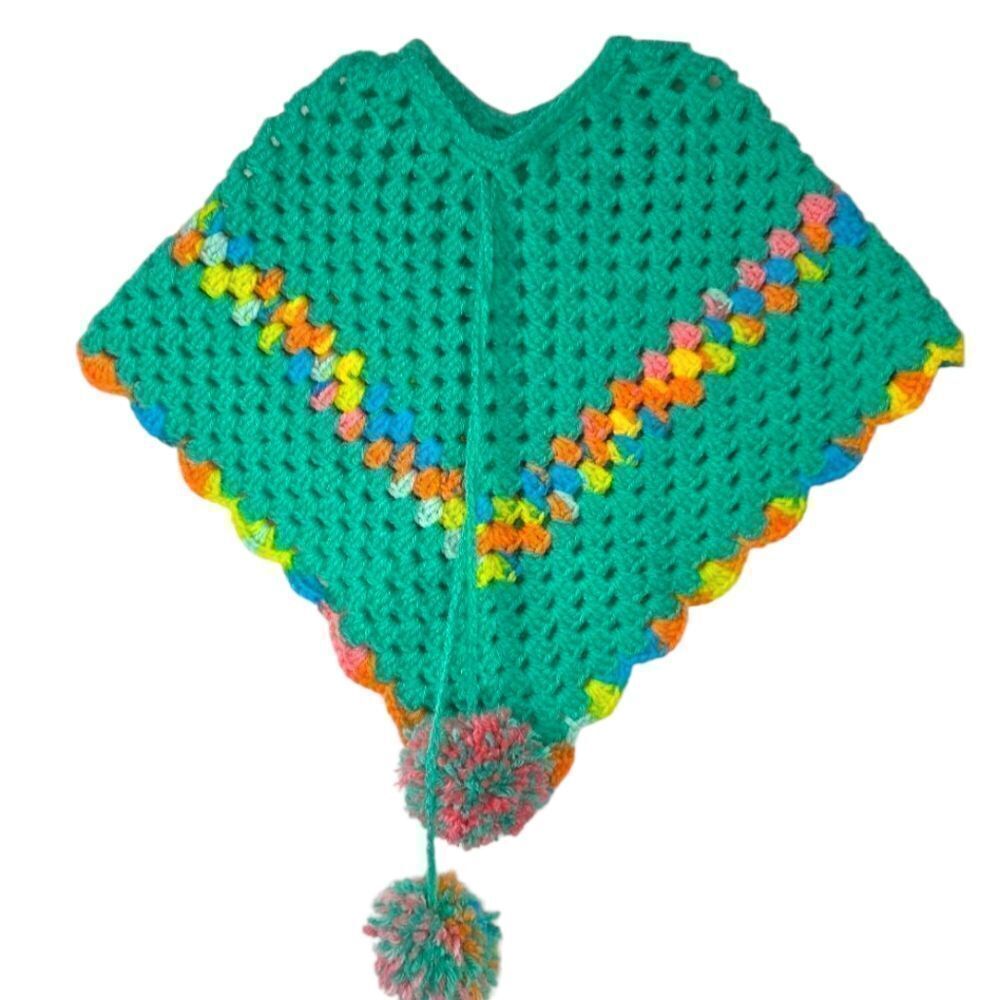 Poncho Handmade vibrant green crochet poncho adorned with pom-poms.